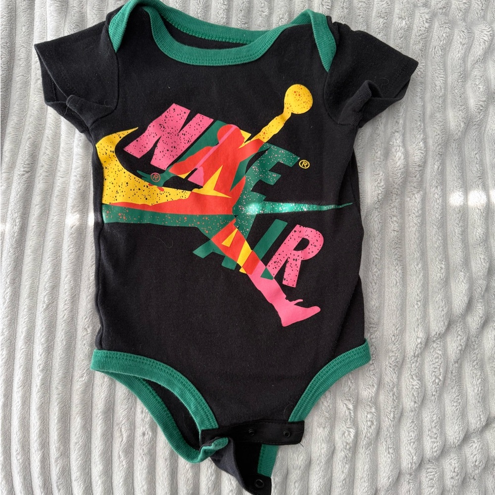 Nike Kids Black Bodysuit with Multicolor Logo